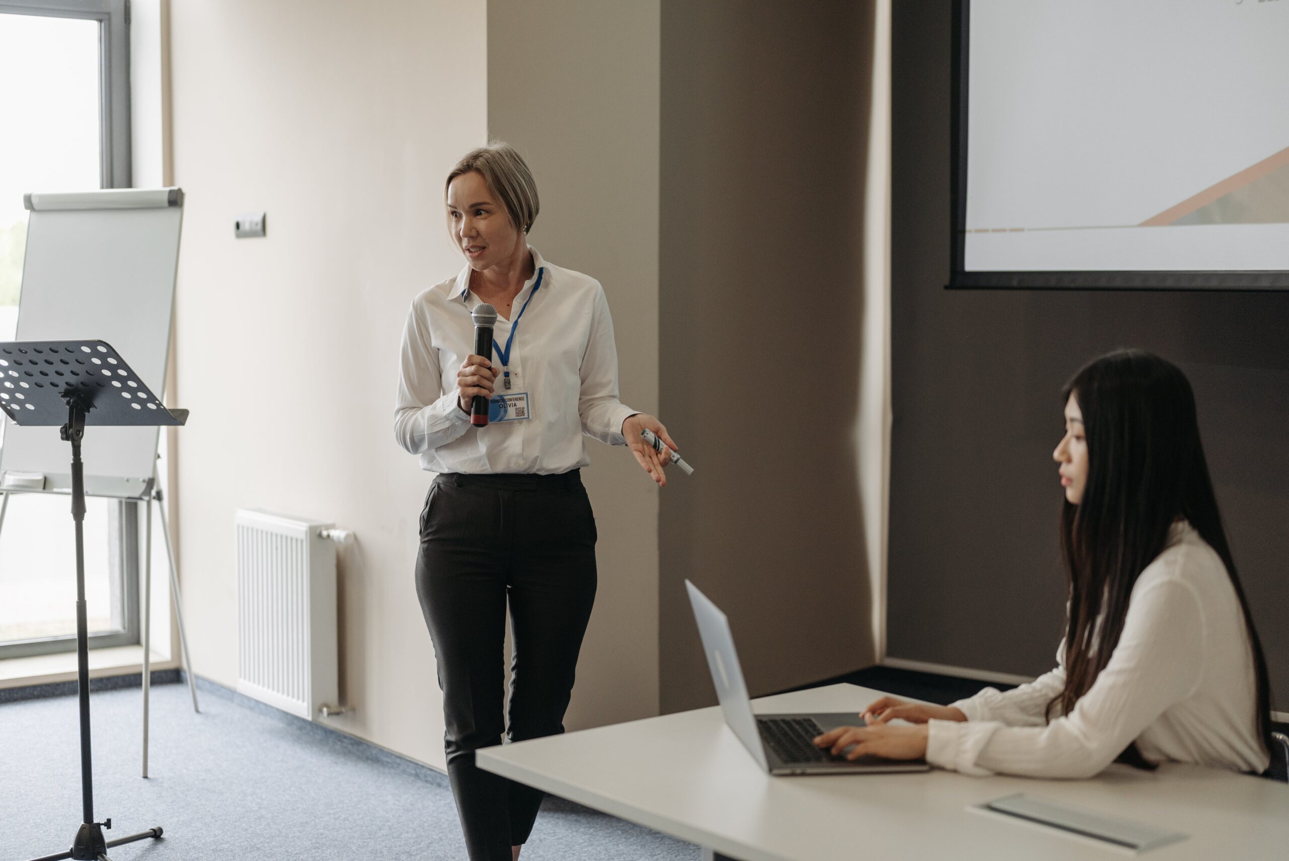 A Woman Talking on the Microphone